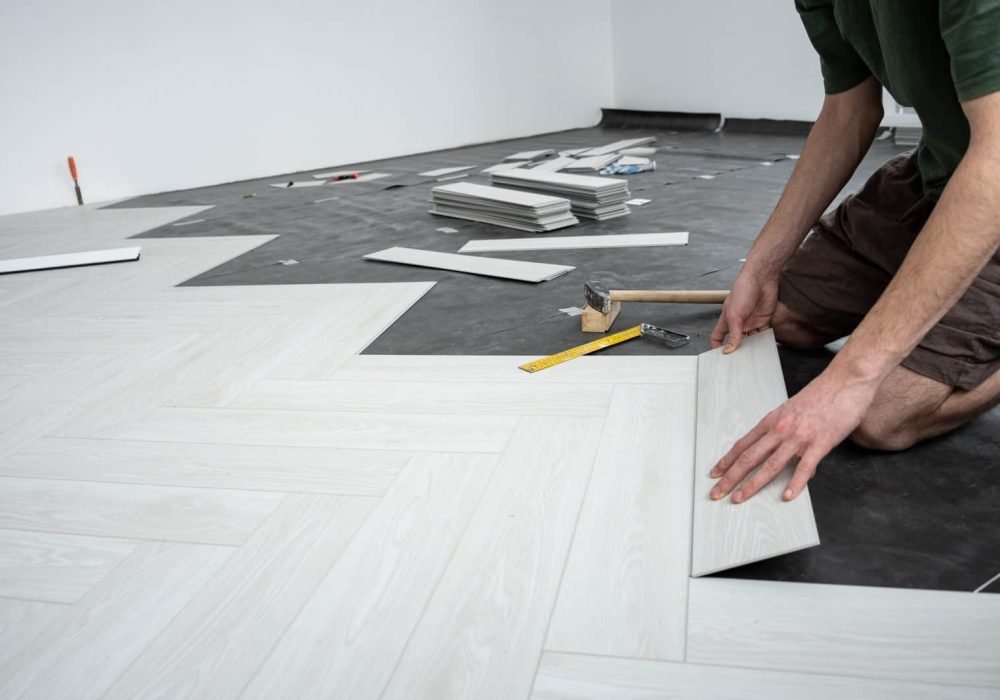 Flooring installation by R. Higuera's construction team.