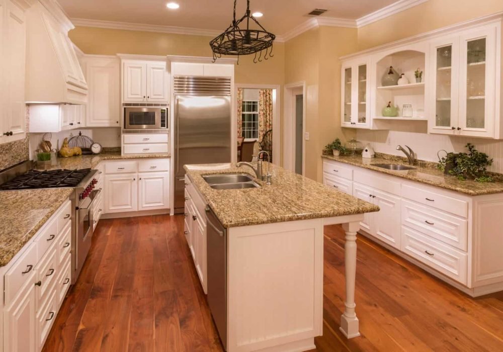 Kitchen renovation with custom cabinetry and stainless steel appliances.