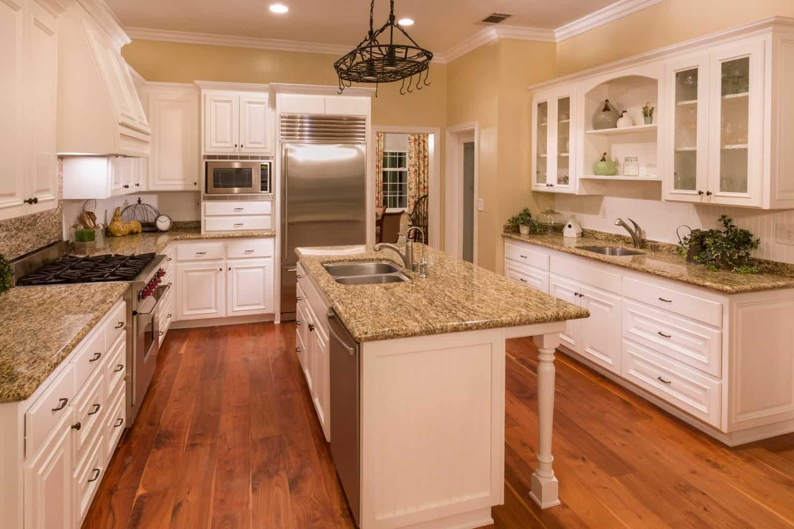 Kitchen renovation with custom cabinetry and stainless steel appliances.