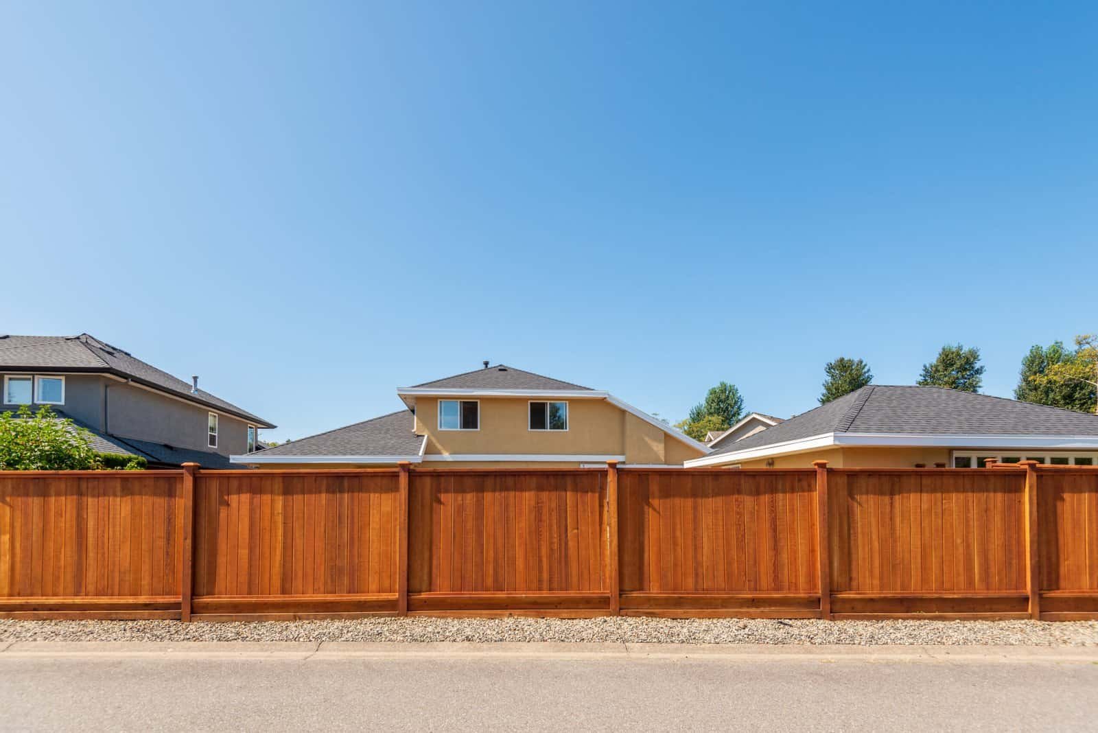 High-quality wooden fence installed by R. Higuera's for privacy and property value.